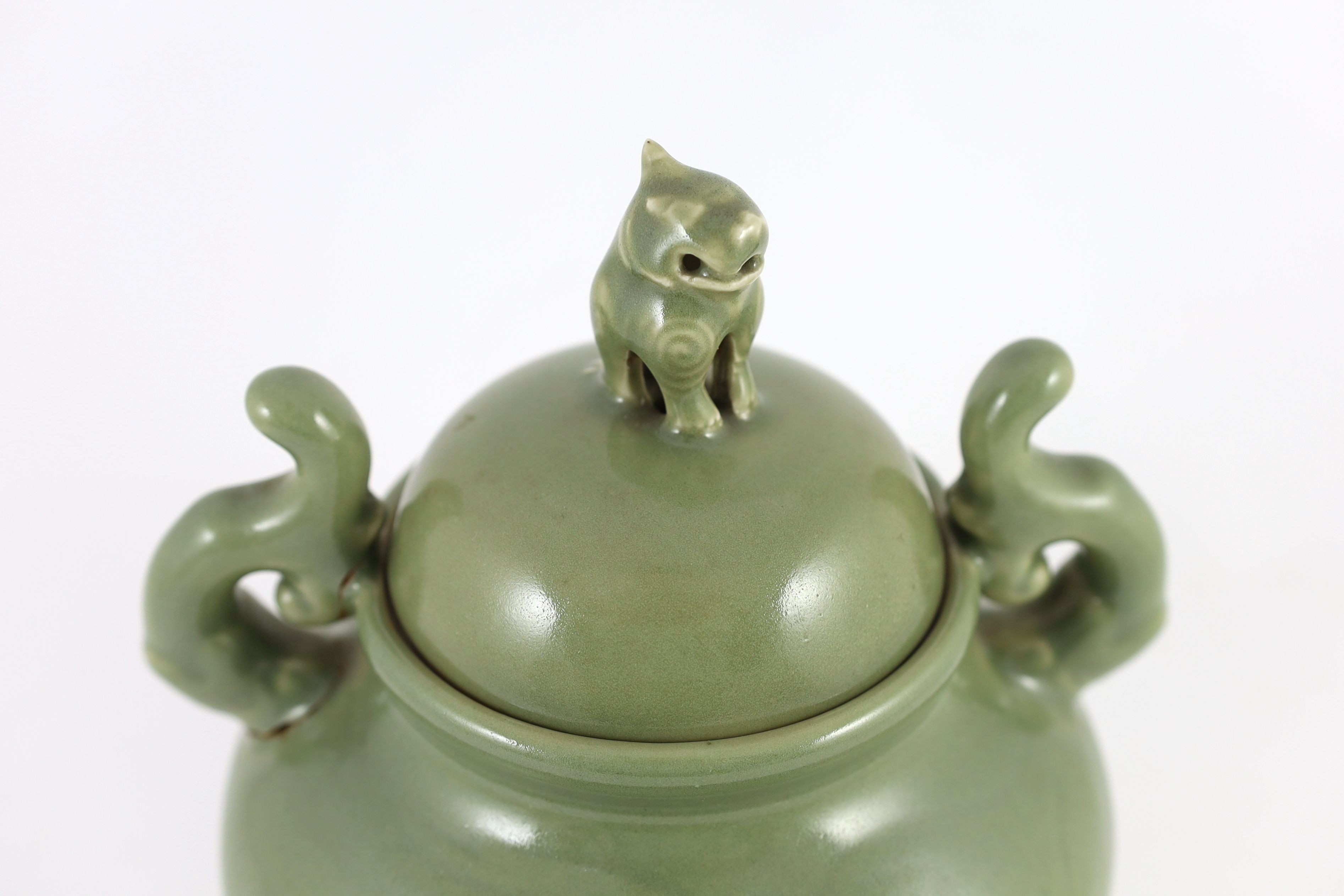 A Chinese celadon glazed tripod censer, late Qing, 26cm